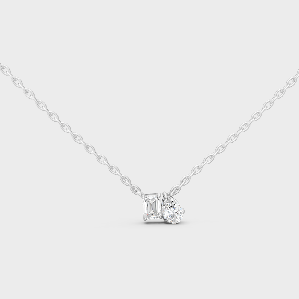 0.96 Ct Emerald & Pear Cut Lab-Grown Diamond Toi-Et-Moi Pendant With Chain In White Gold